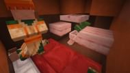 The villagers and zombie added to the farm's internals (Image via Mojang)